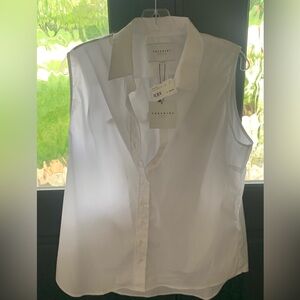 Sleeveless White The Shirt by Rochelle Behrens. New with tags and never worn.